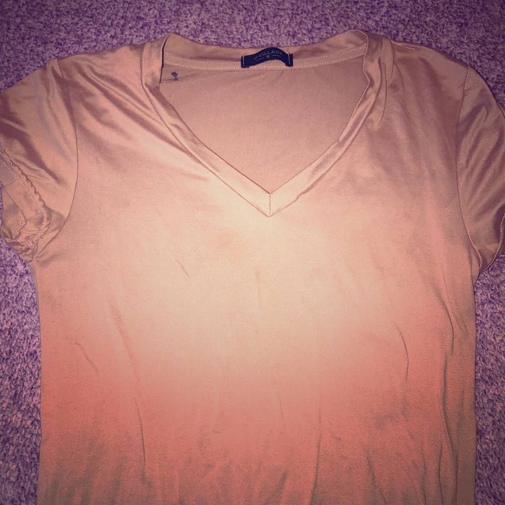A Pink Cream Colored Shirt